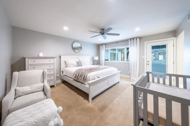 a front view of house with yard outdoor seating and barbeque oven