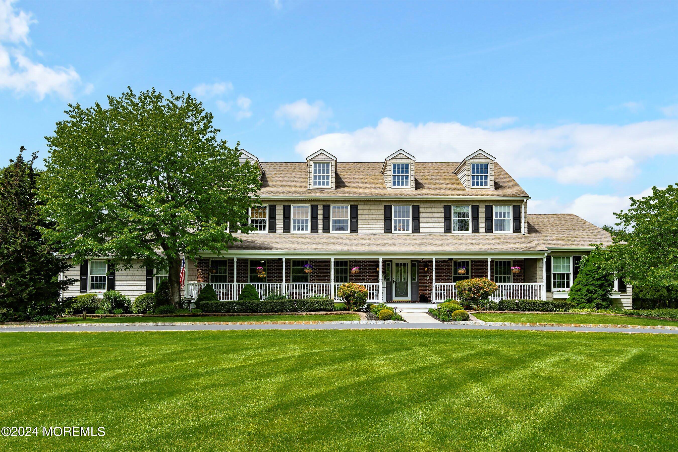 2 Pullen Drive Millstone Township, NJ 08535 - Photo 1 of 87 a front view of a house with a garden