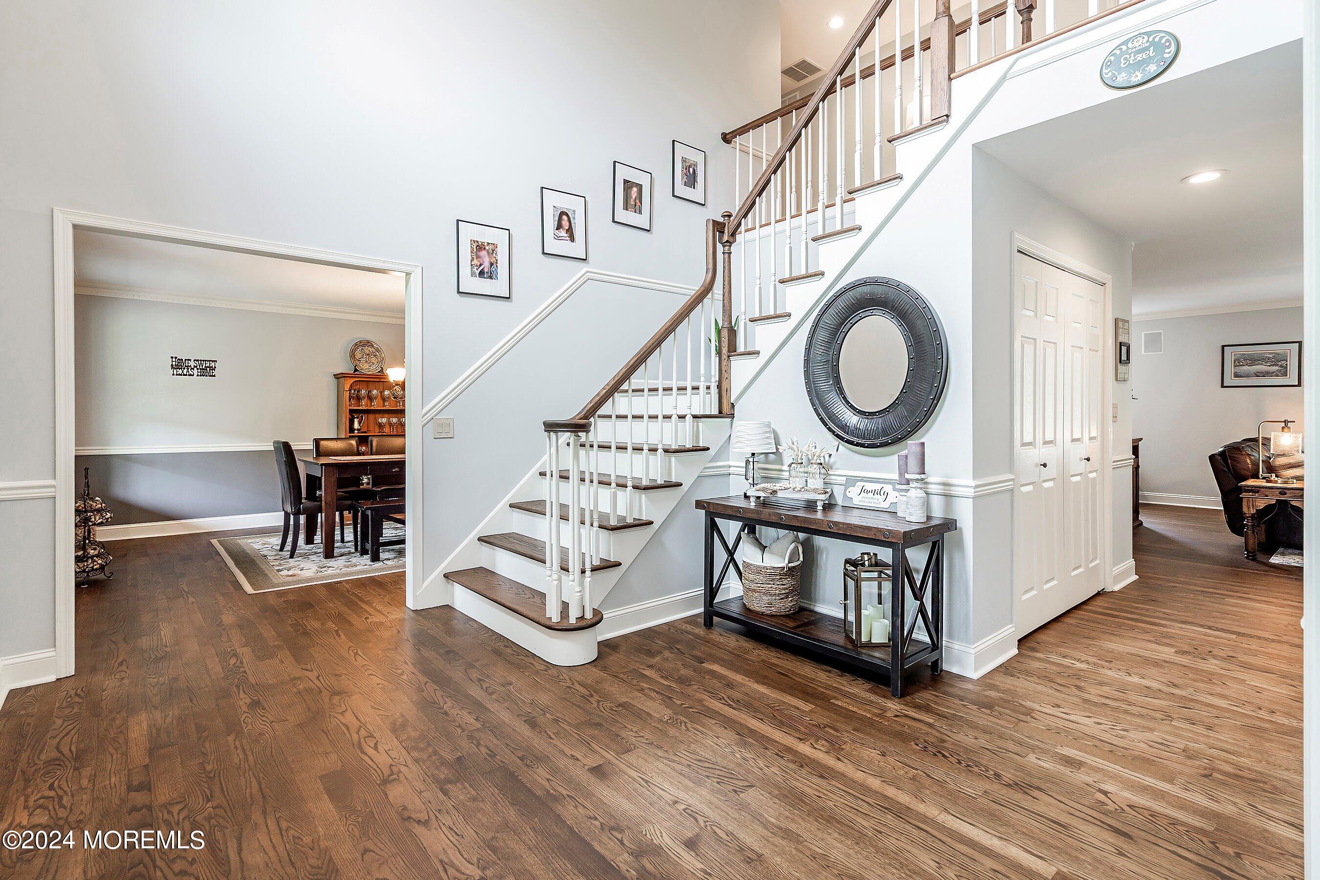 2 Pullen Drive Millstone Township, NJ 08535 - Photo 14 of 87 a living room with fireplace furniture and a wooden floor