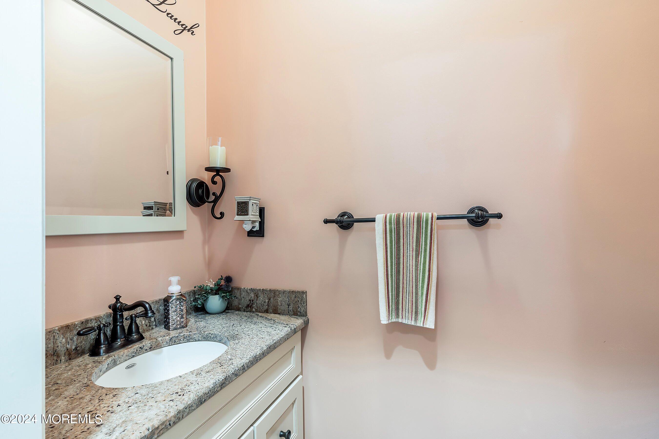 2 Pullen Drive Millstone Township, NJ 08535 - Photo 28 of 87 a bathroom with a granite countertop sink and mirror