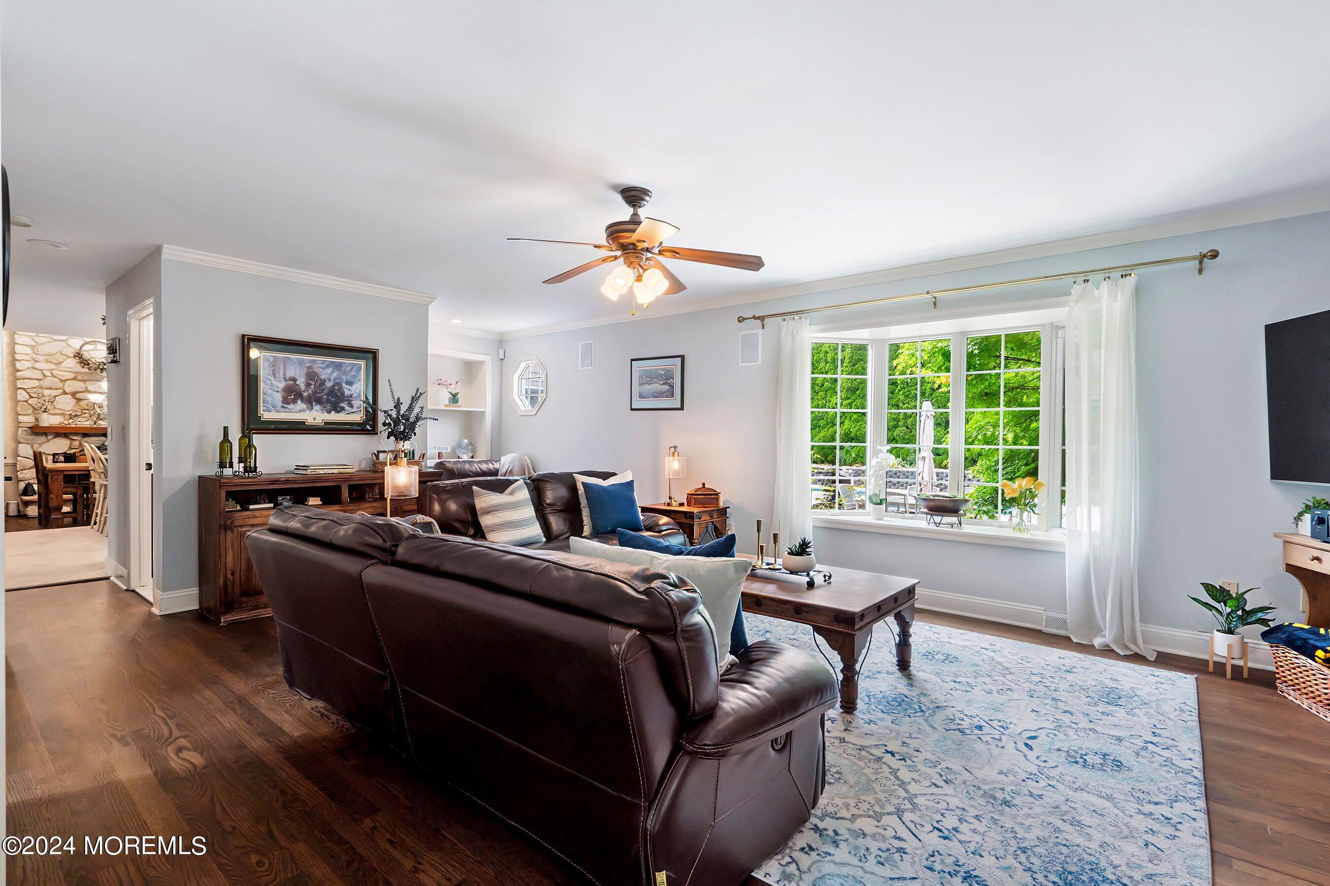 2 Pullen Drive Millstone Township, NJ 08535 - Photo 32 of 87 a living room with furniture window and wooden floor