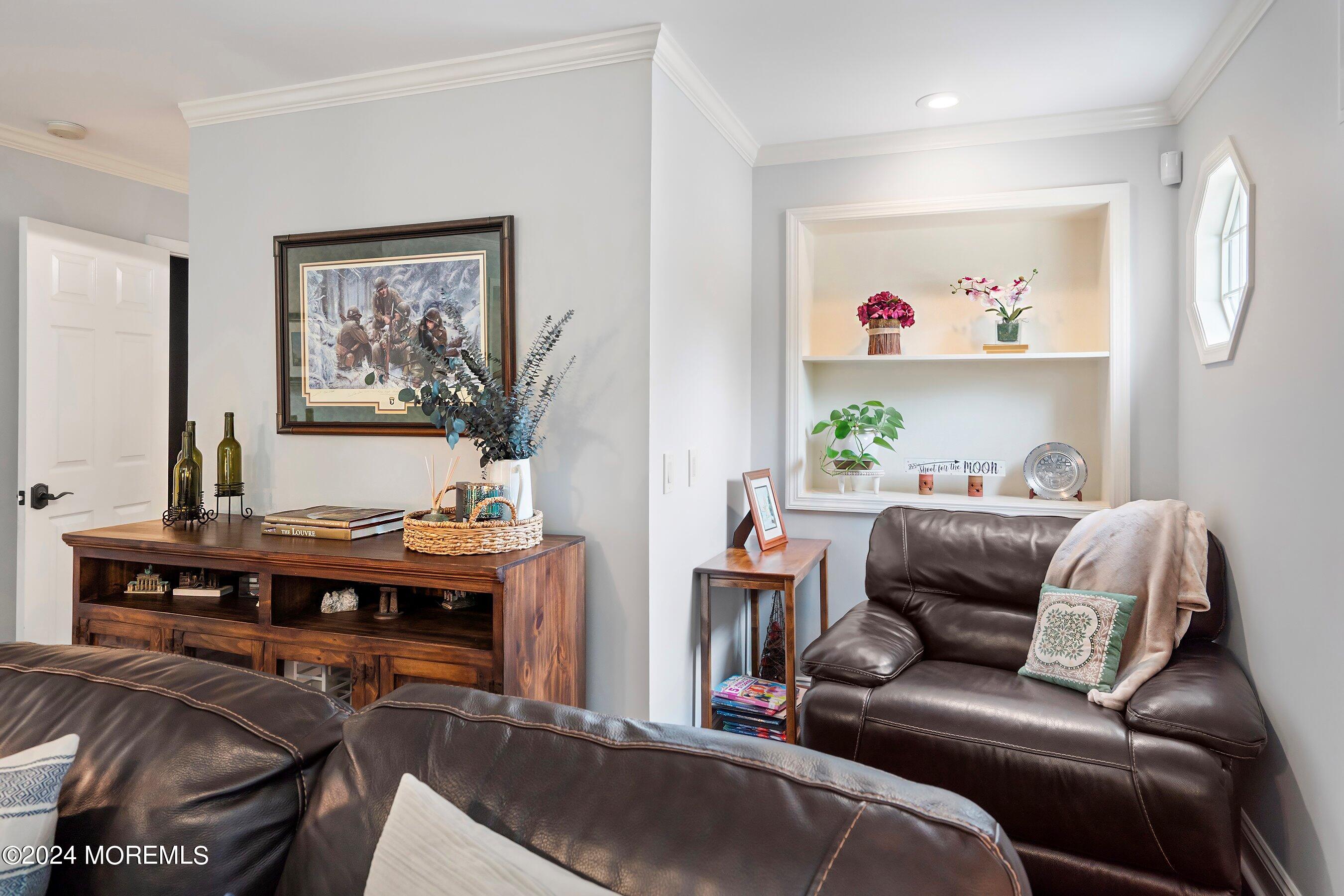 2 Pullen Drive Millstone Township, NJ 08535 - Photo 34 of 87 a living room with furniture and a flat screen tv