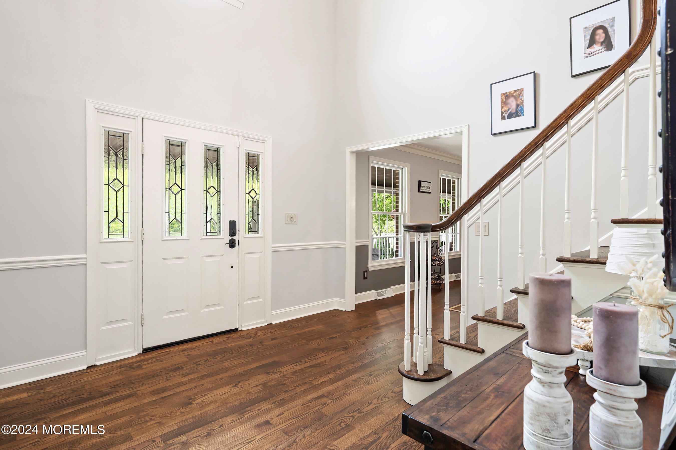2 Pullen Drive Millstone Township, NJ 08535 - Photo 40 of 87 a view of entryway and hall with wooden floor