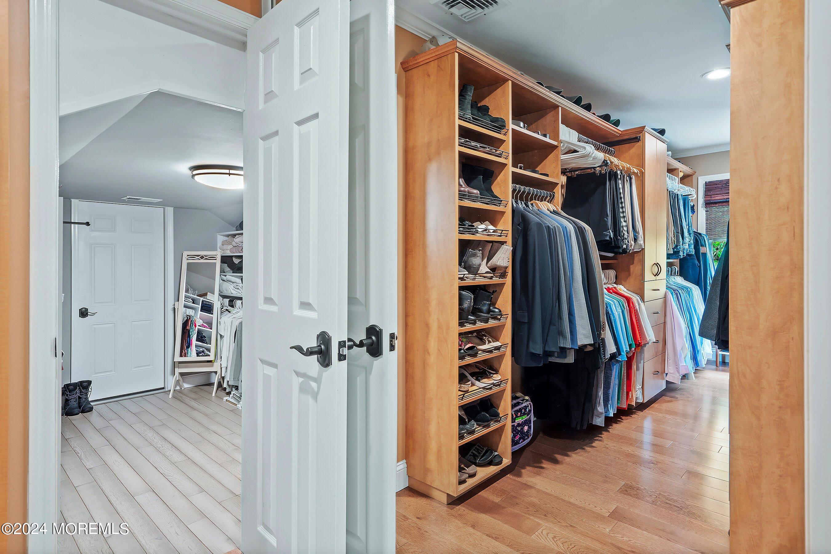 2 Pullen Drive Millstone Township, NJ 08535 - Photo 45 of 87 a view of walk in closet with clothes and shoes