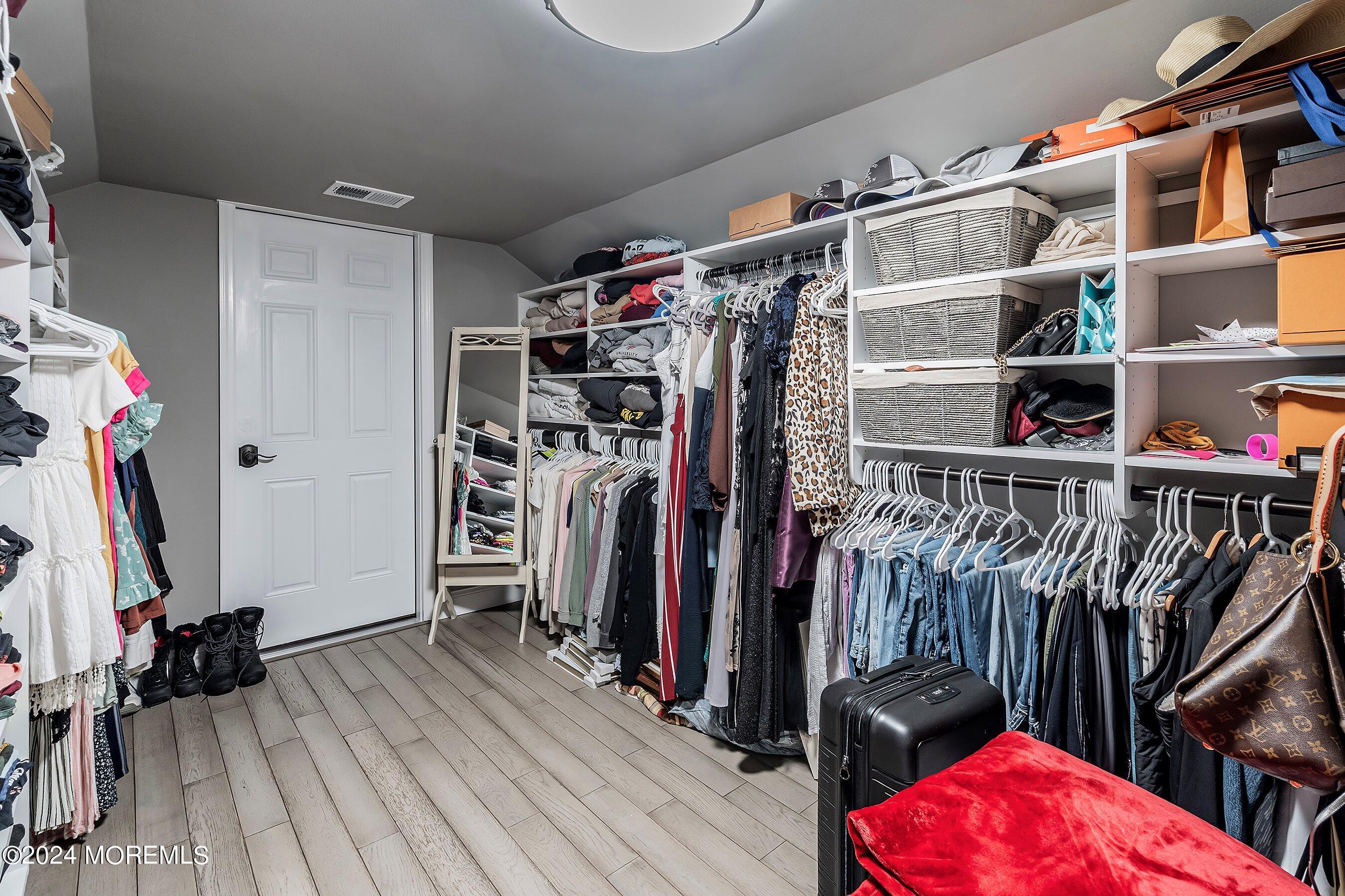 2 Pullen Drive Millstone Township, NJ 08535 - Photo 46 of 87 a view of walk in closet with clothes and shoes