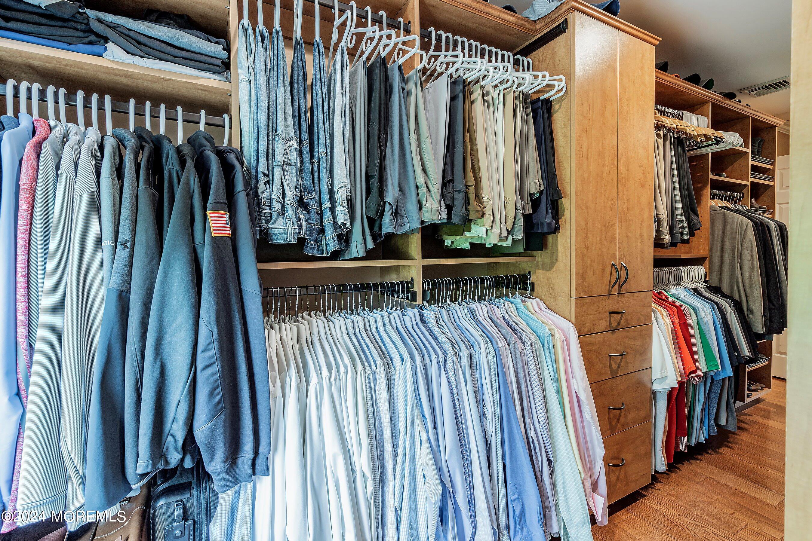 2 Pullen Drive Millstone Township, NJ 08535 - Photo 47 of 87 a view of walk in closet with clothes and shoes