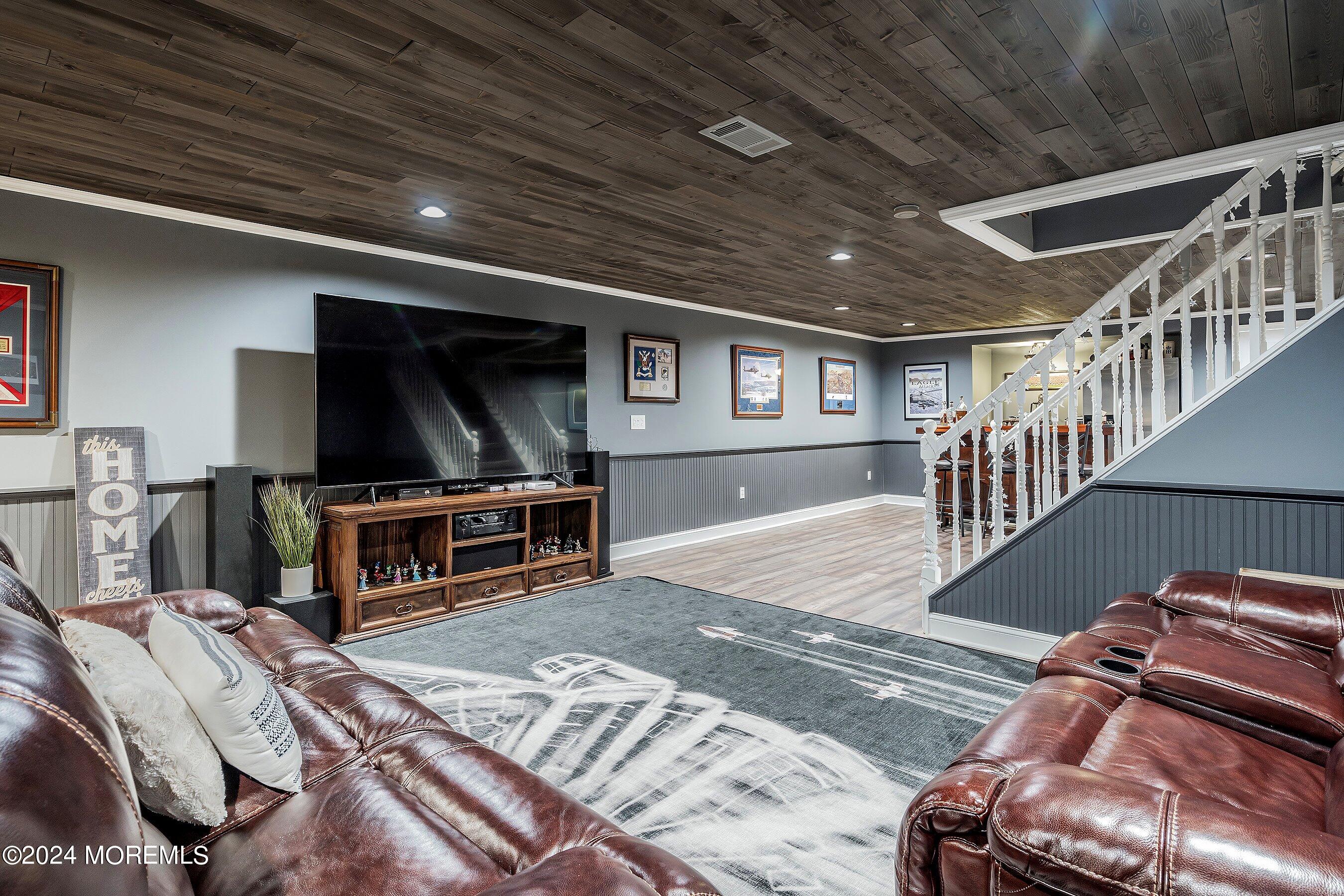2 Pullen Drive Millstone Township, NJ 08535 - Photo 66 of 87 a living room with furniture and a flat screen tv