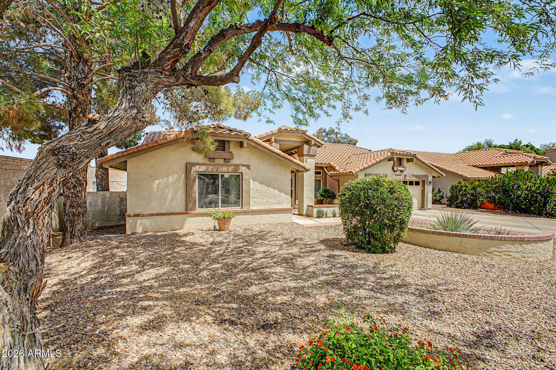 1924 East El Freda Road Tempe, AZ 85284 - Photo 52 of 56 a view of a house with a yard