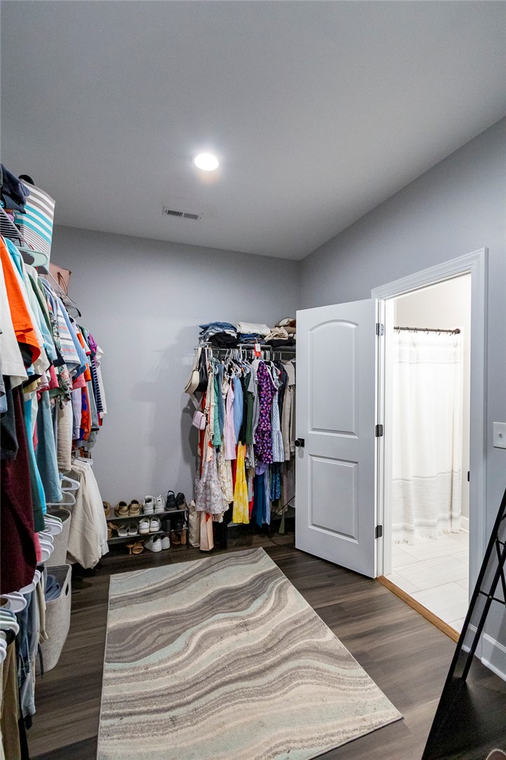 3080 McGee Road Iva, SC 29655 - Photo 36 of 49 Walk-in closet offers extensive storage space with convenient access to an adjacent bathroom.