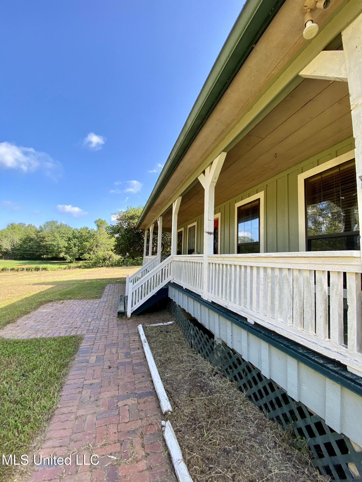 92 Dove Ridge Road Carriere, MS 39426 - Photo 4 of 51 2C Front Porch, IMG_4871