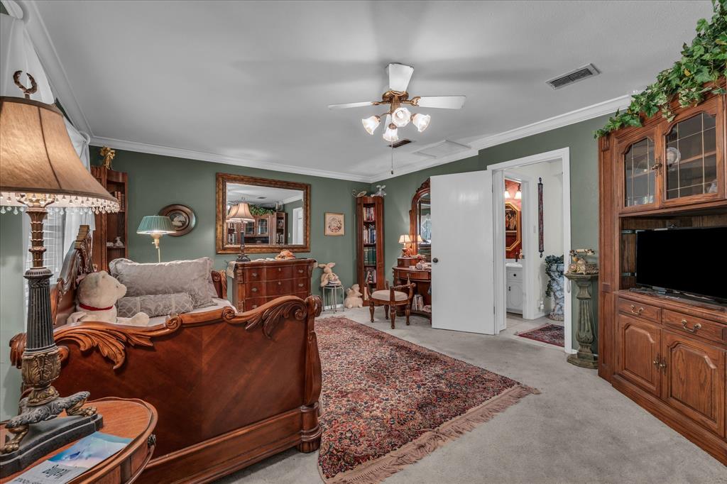 3405 Edna Avenue Waco, TX 76708 - Photo 11 of 29 a living room with furniture and a flat screen tv