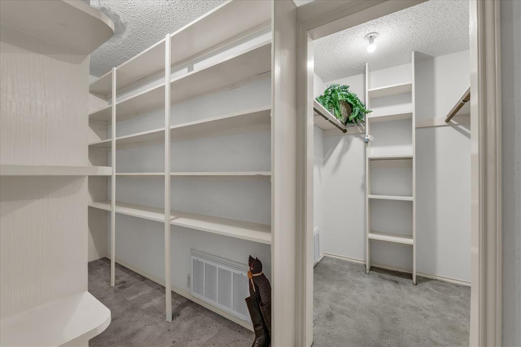 3405 Edna Avenue Waco, TX 76708 - Photo 15 of 29 a room with cabinets and a potted plant