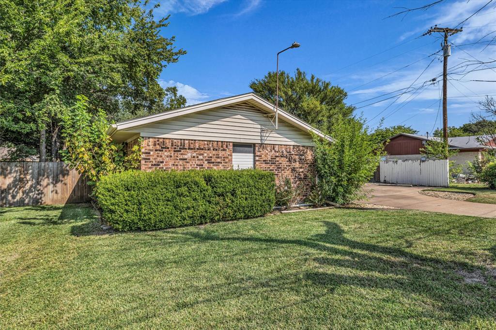 3405 Edna Avenue Waco, TX 76708 - Photo 19 of 29 a front view of a house with a garden