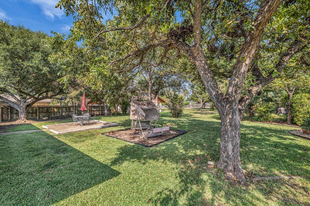 3405 Edna Avenue Waco, TX 76708 - Photo 20 of 29 a table and chairs in the garden