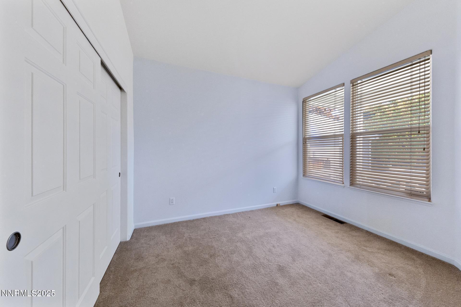 709 Caughlin Glen Reno, NV 89519 - Photo 19 of 41 a view of an empty room with a window