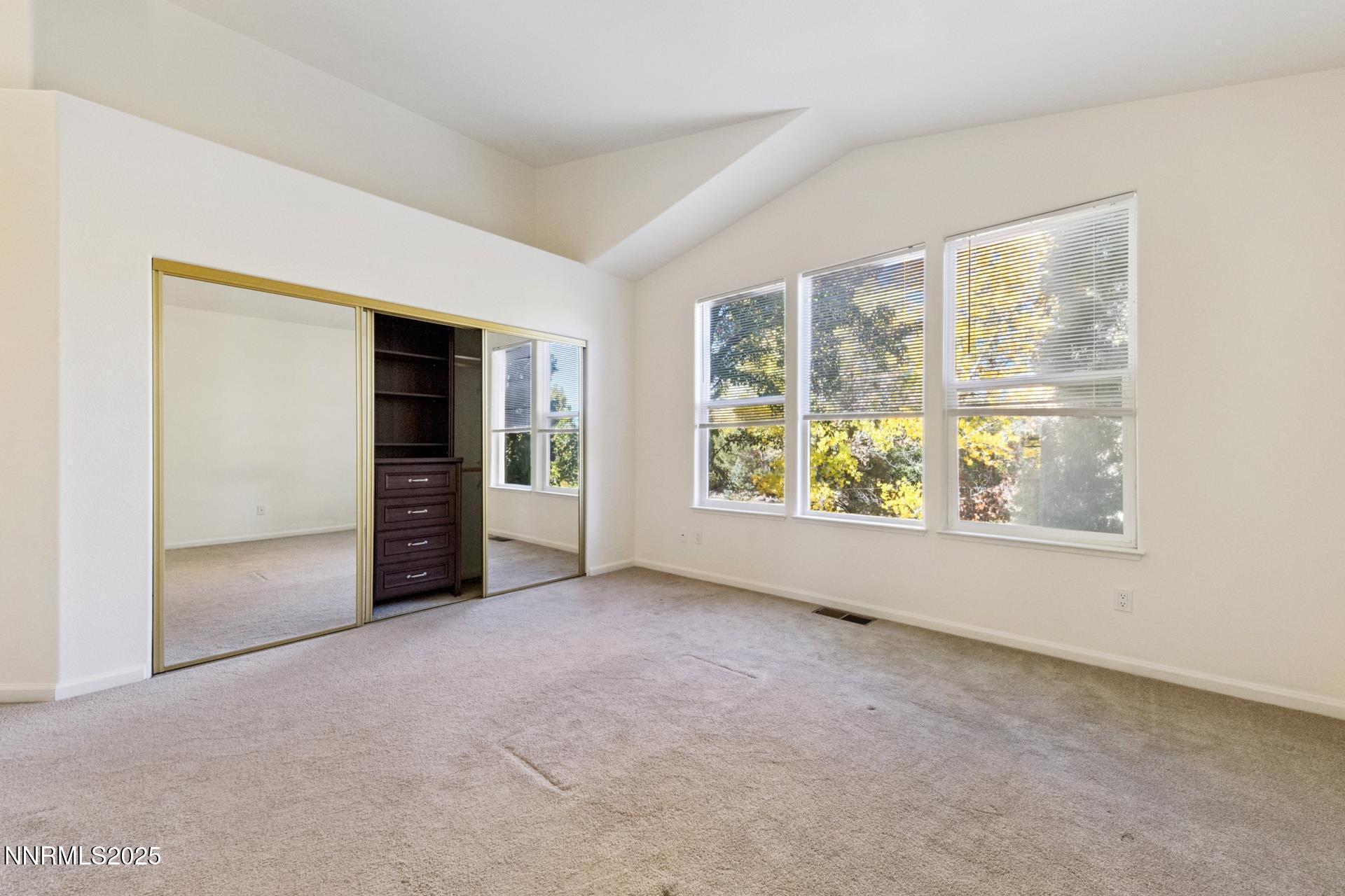 709 Caughlin Glen Reno, NV 89519 - Photo 20 of 41 an empty room with windows and closet