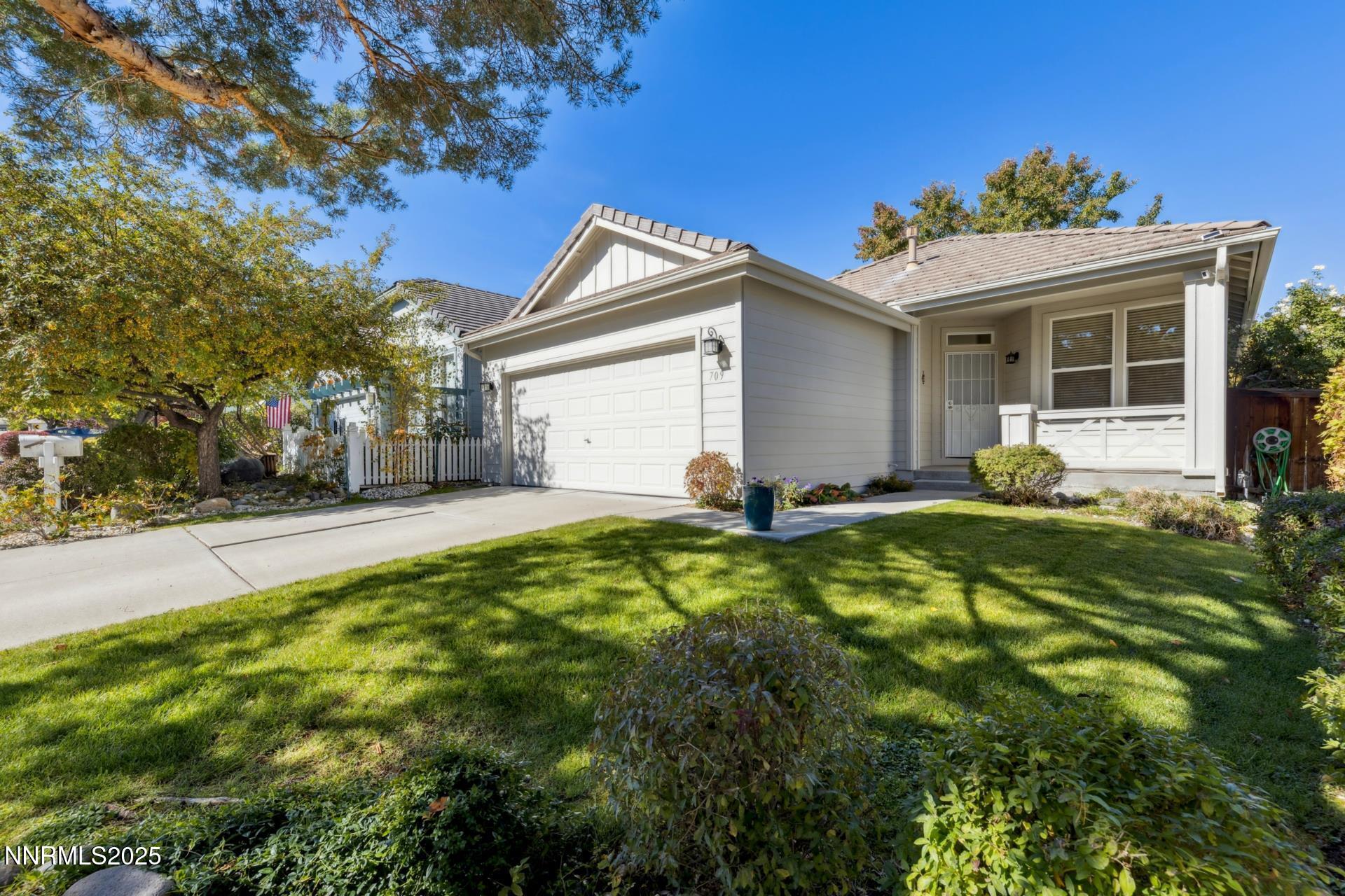 709 Caughlin Glen Reno, NV 89519 - Photo 2 of 41 a house view with a garden space