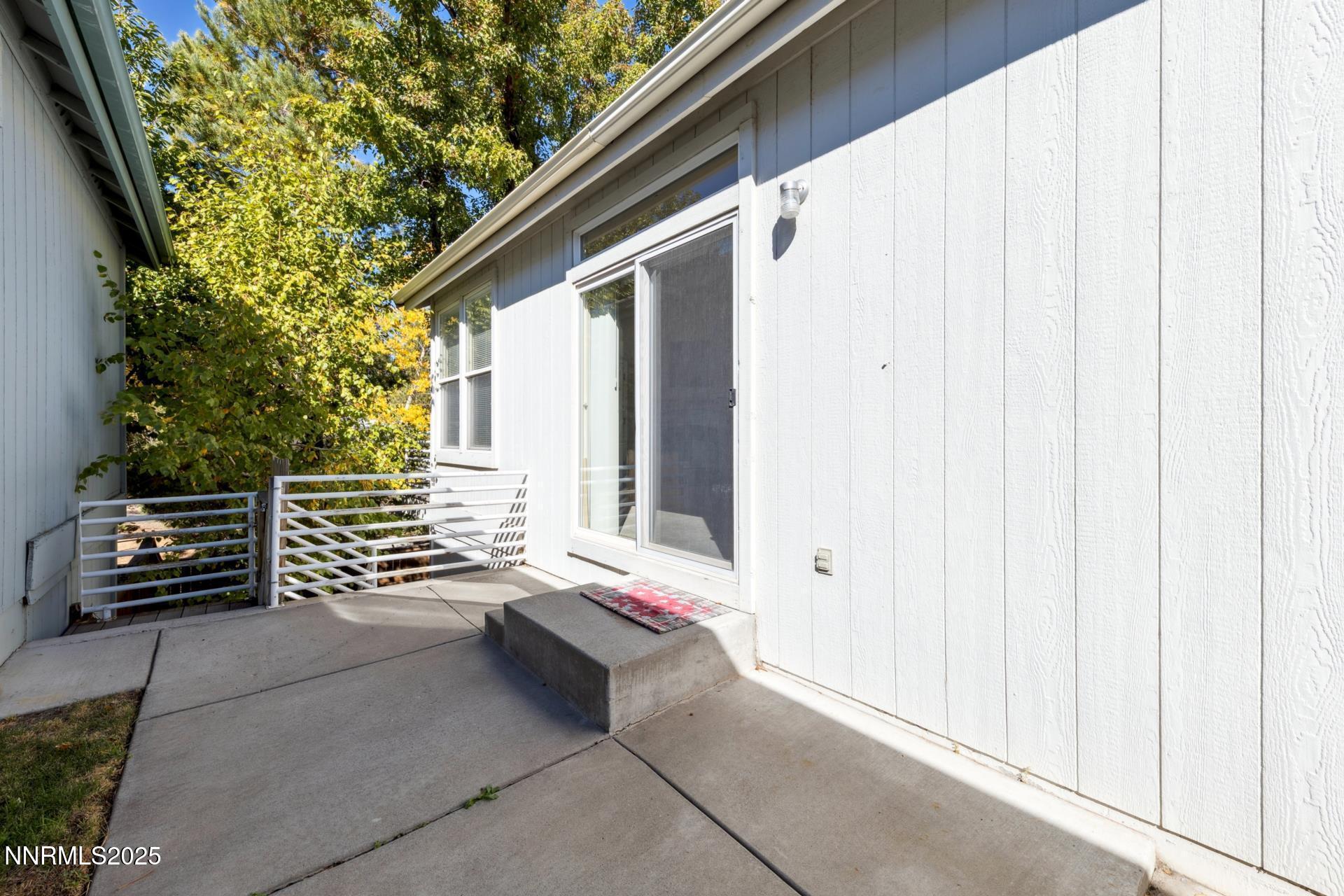 709 Caughlin Glen Reno, NV 89519 - Photo 23 of 41 a view of a house with a yard