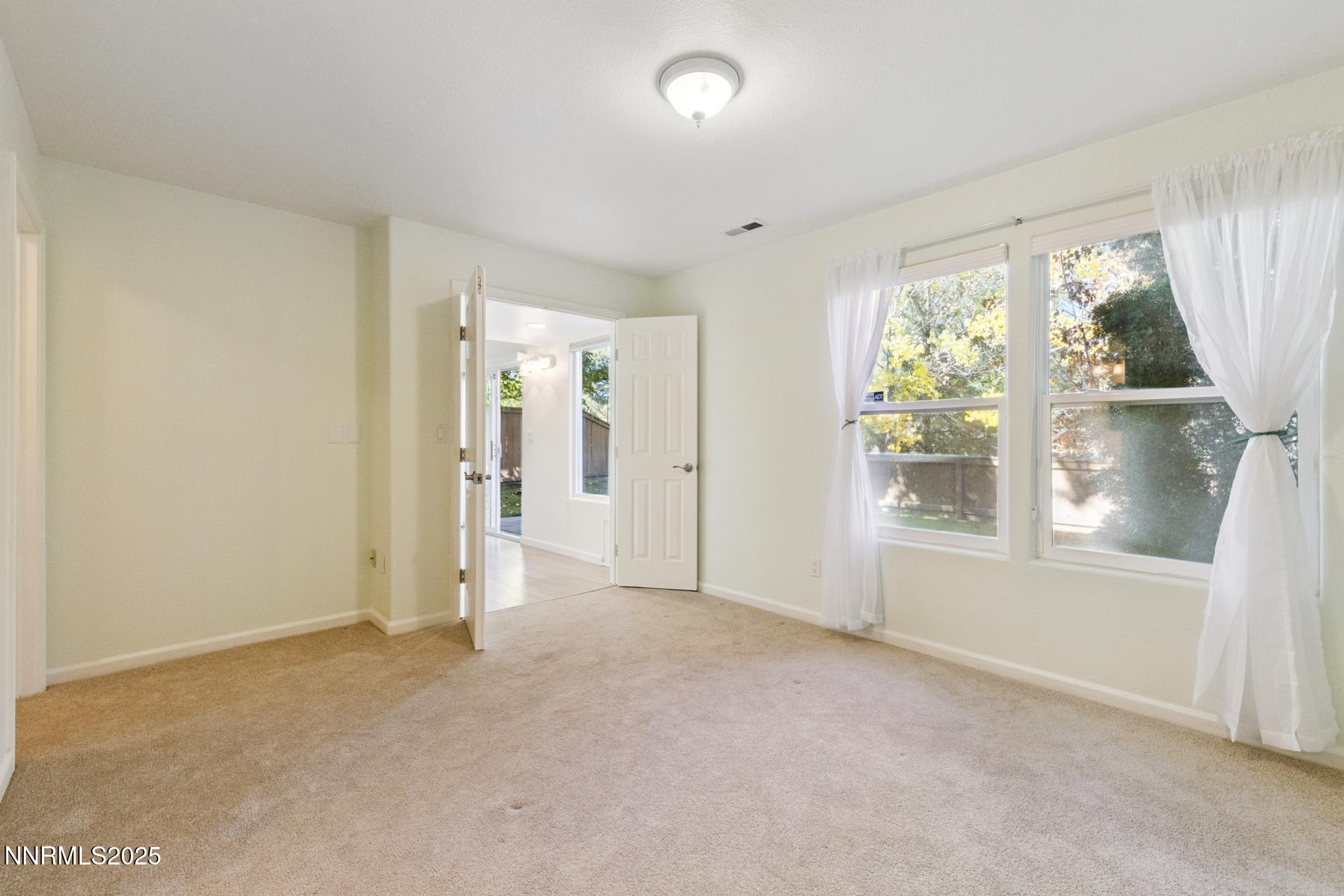 709 Caughlin Glen Reno, NV 89519 - Photo 31 of 41 a view of an empty room with a window