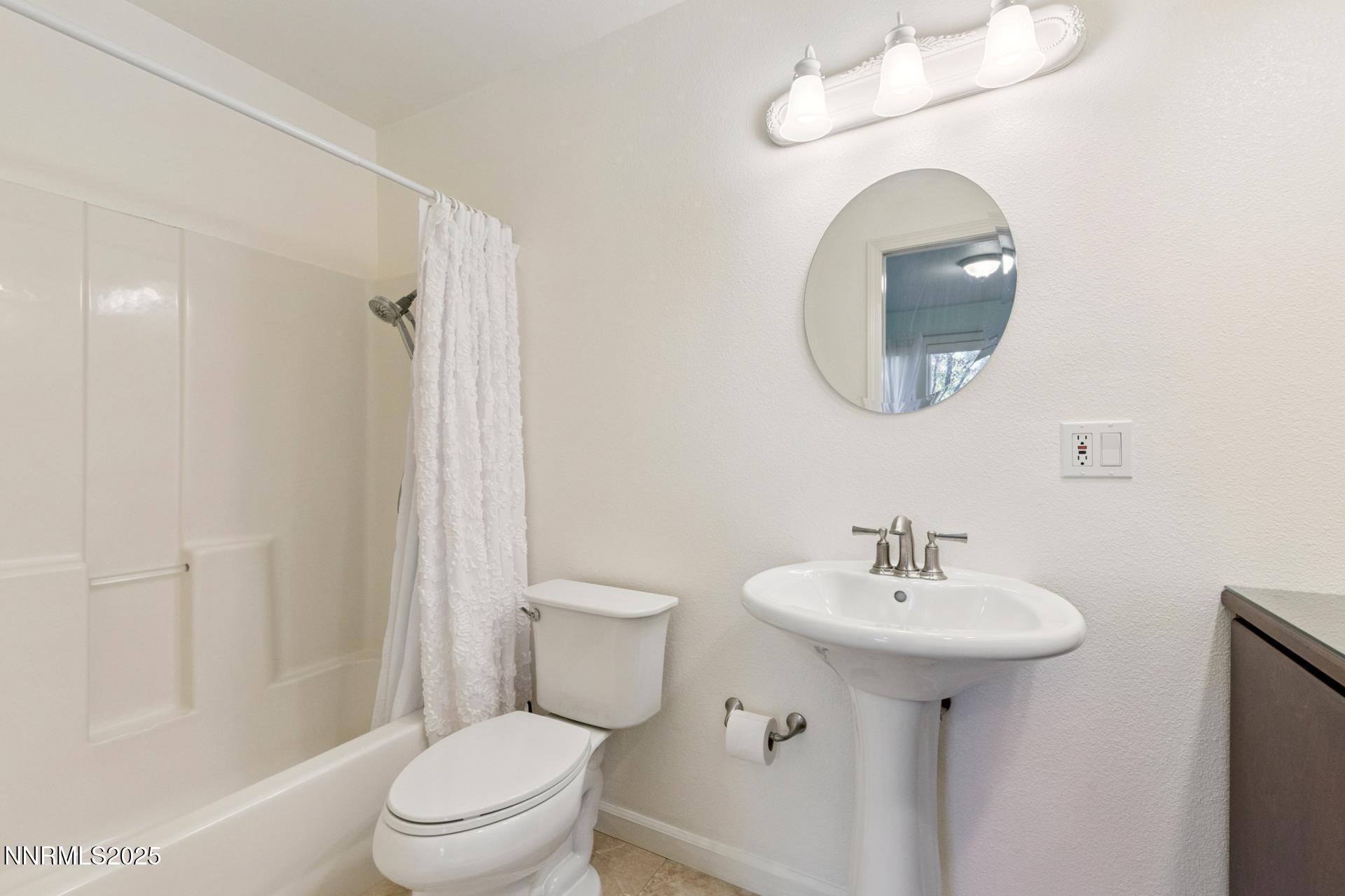709 Caughlin Glen Reno, NV 89519 - Photo 33 of 41 a bathroom with a sink toilet and a mirror