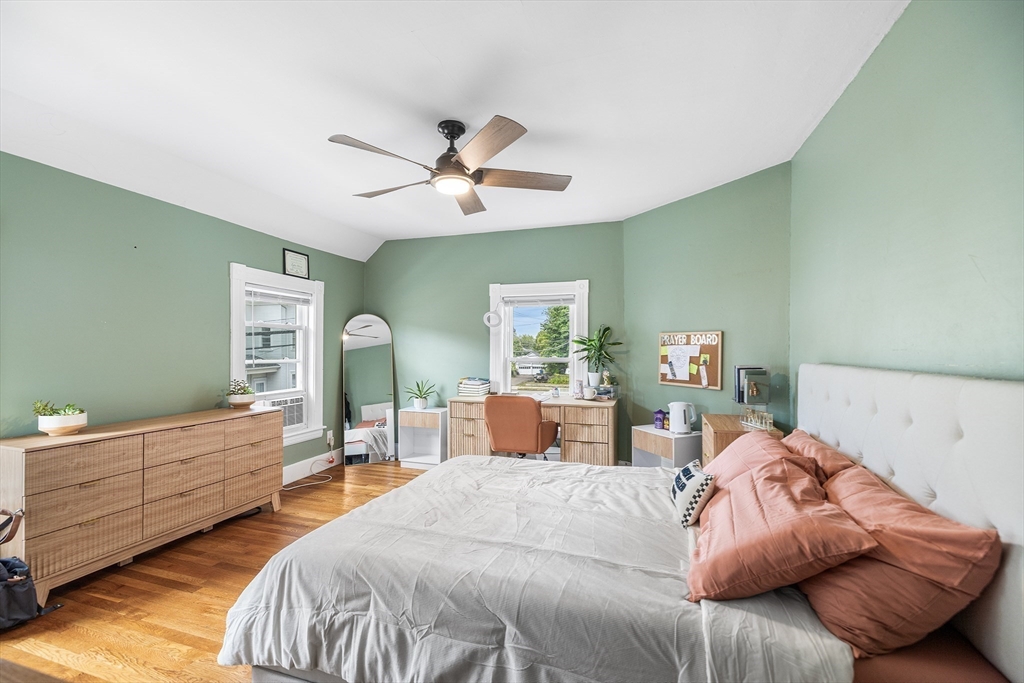 4 State Street, Unit 4 Milford, MA 01757 - Photo 12 of 23 a bedroom with two beds and a large window