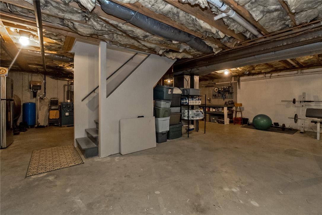 9461 Red Road Kempton, PA 19529 - Photo 47 of 55 A utilitarian basement space offers ample room for storage and potential for future development.