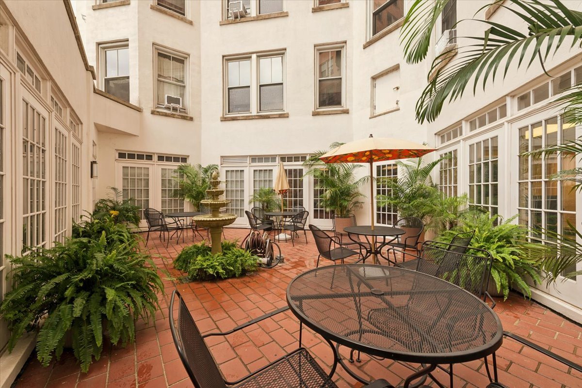 5555 North Sheridan Road, Unit 1716 Chicago, IL 60640 - Photo 24 of 24 a view of a chairs and table in patio