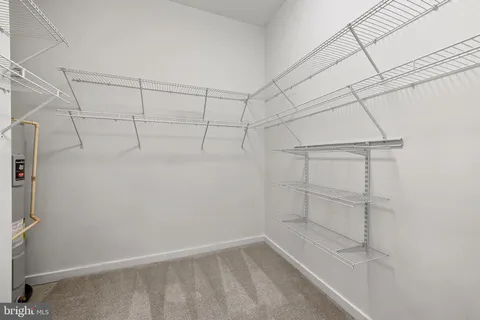 a view of a room with racks on the wall