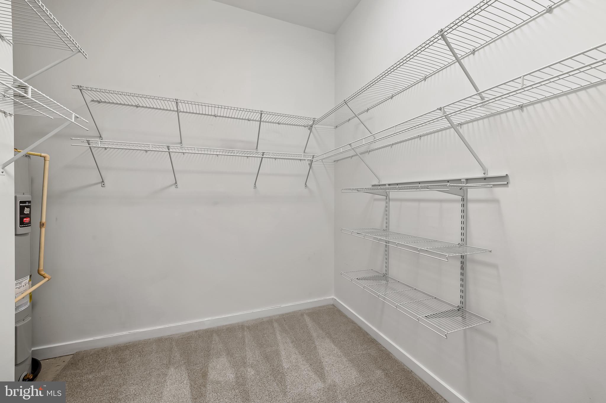 1209 North Charles Street, Unit 314 Baltimore, MD 21201 - Photo 23 of 34 a view of a room with racks on the wall