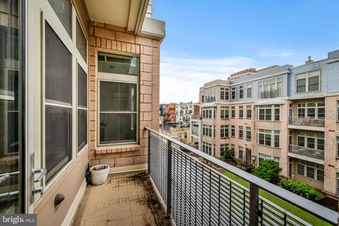 a view of a building from a balcony