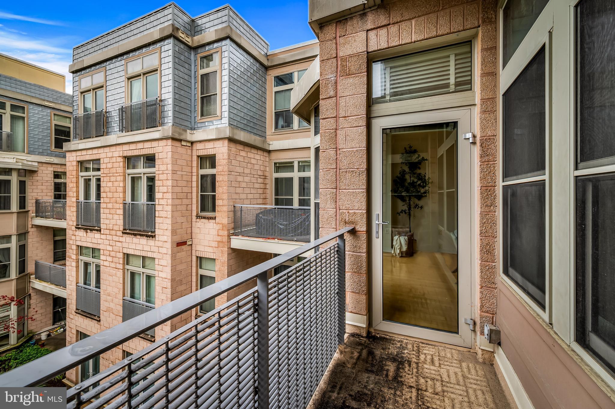 1209 North Charles Street, Unit 314 Baltimore, MD 21201 - Photo 31 of 34 a view of a house with a glass door