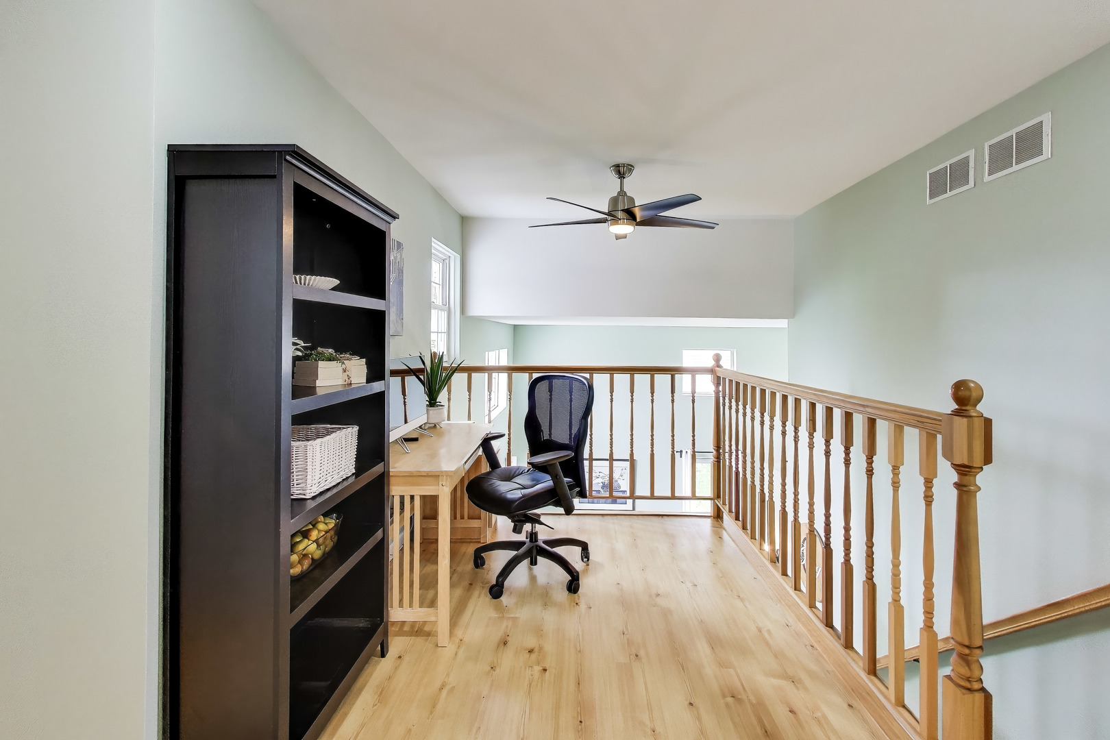 470 Country Place Lindenhurst, IL 60046 - Photo 12 of 29 a view of a workspace with furniture and wooden floor