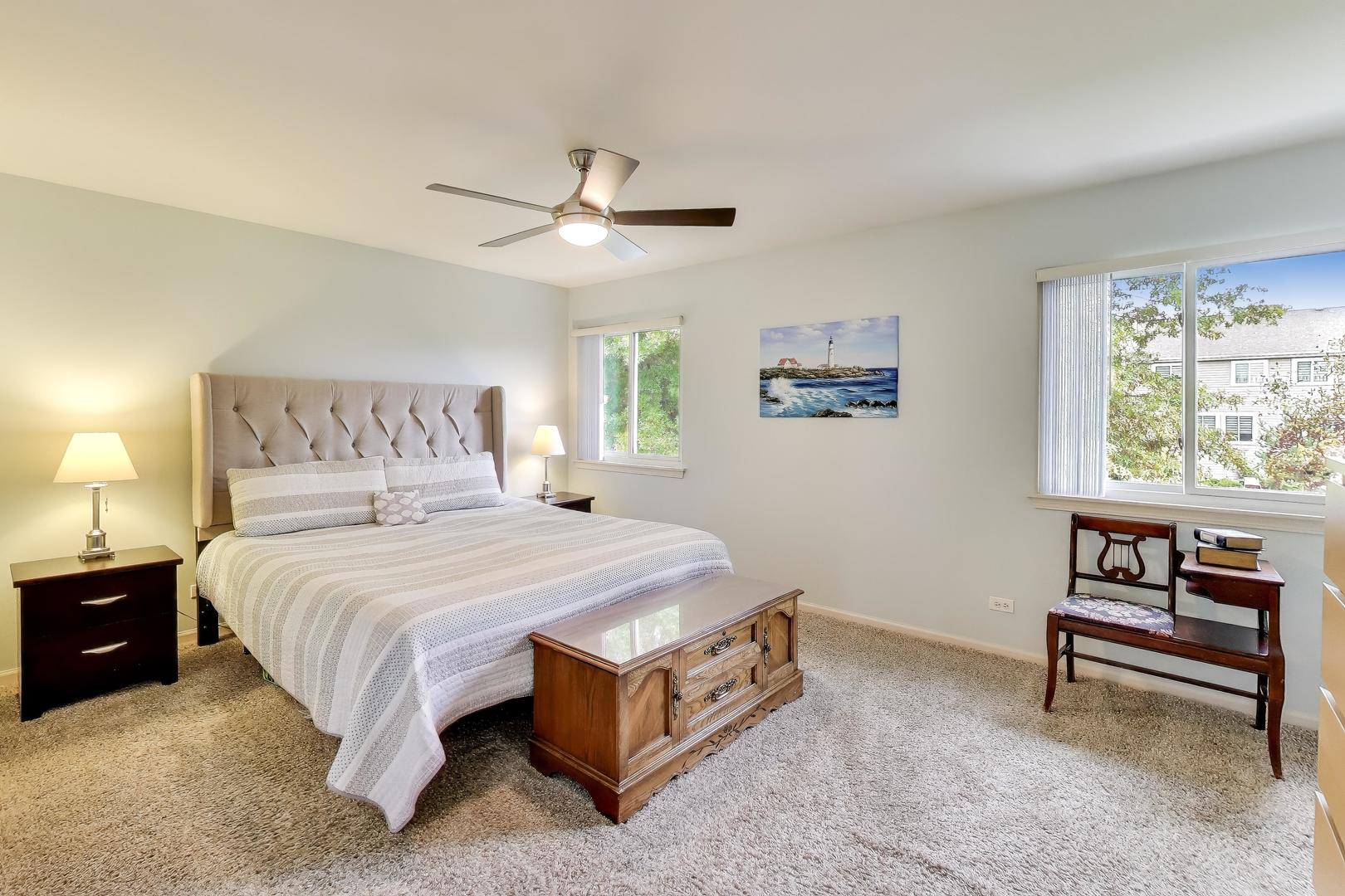 470 Country Place Lindenhurst, IL 60046 - Photo 13 of 29 a spacious bedroom with a bed and a window