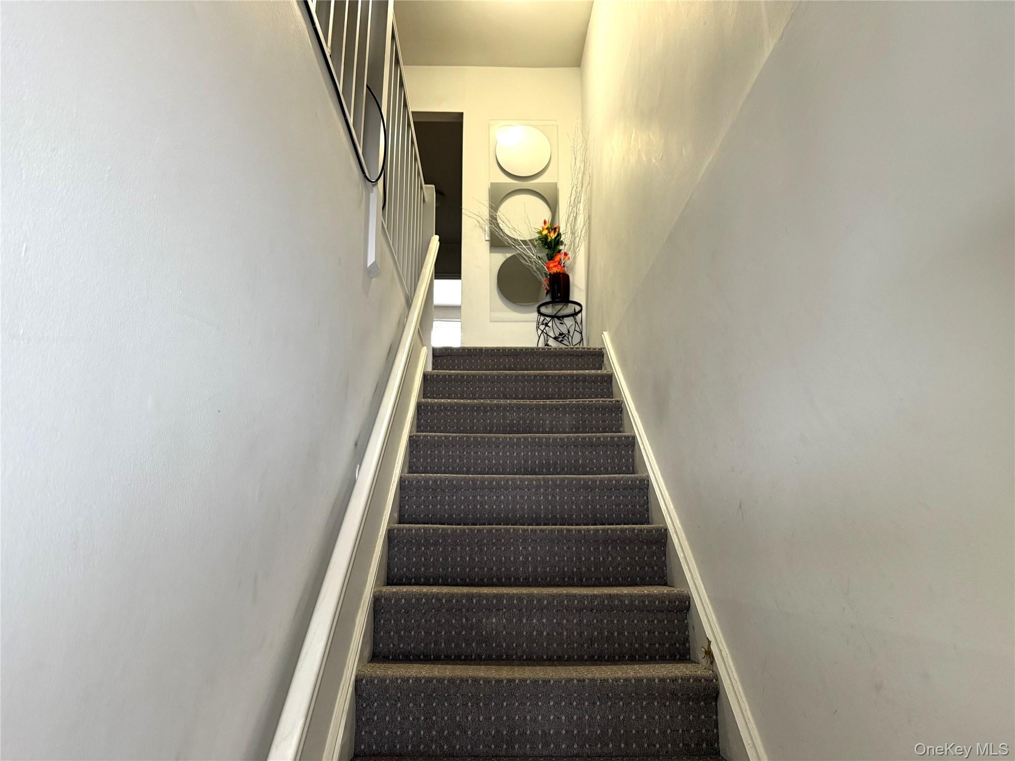 3 Wyndover Woods Lane, Unit 10 White Plains, NY 10603 - Photo 11 of 11 Stairway featuring baseboards