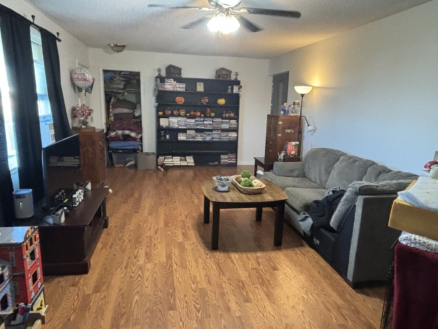 1736 North 600 East Road Gilman, IL 60938 - Photo 3 of 7 a living room with furniture and a flat screen tv