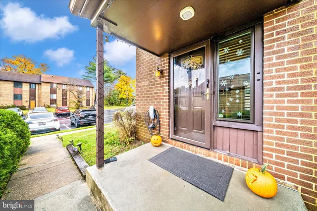 a swimming pool with chairs