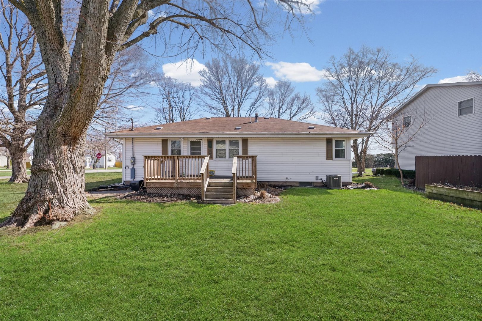 404 South Maple Street Gilman, IL 60938 - Photo 26 of 28 a view of a house with backyard and sitting area