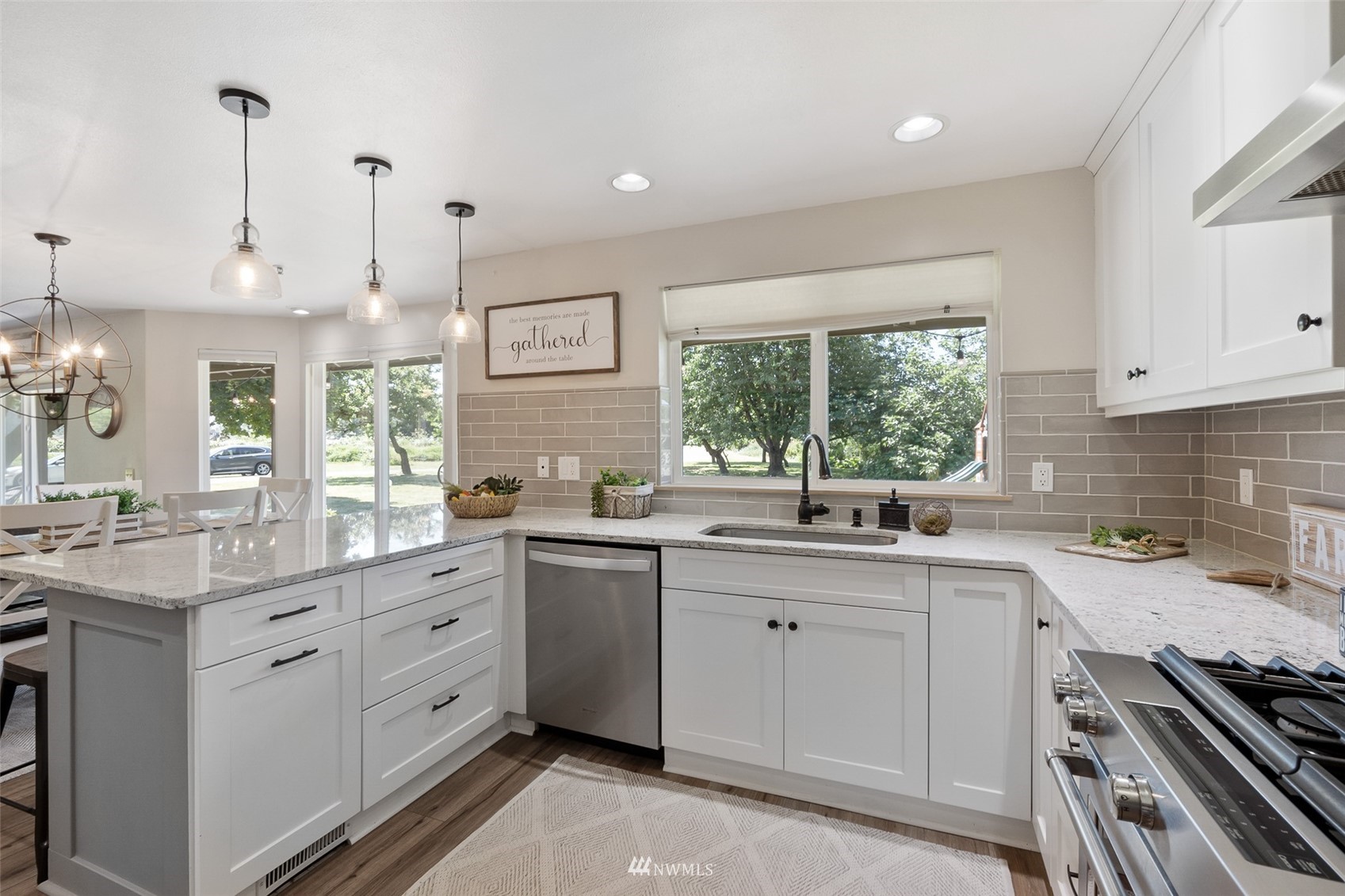 21847 Frager Road South Kent, WA 98032 - Photo 13 of 34 a kitchen with a sink stove and cabinets