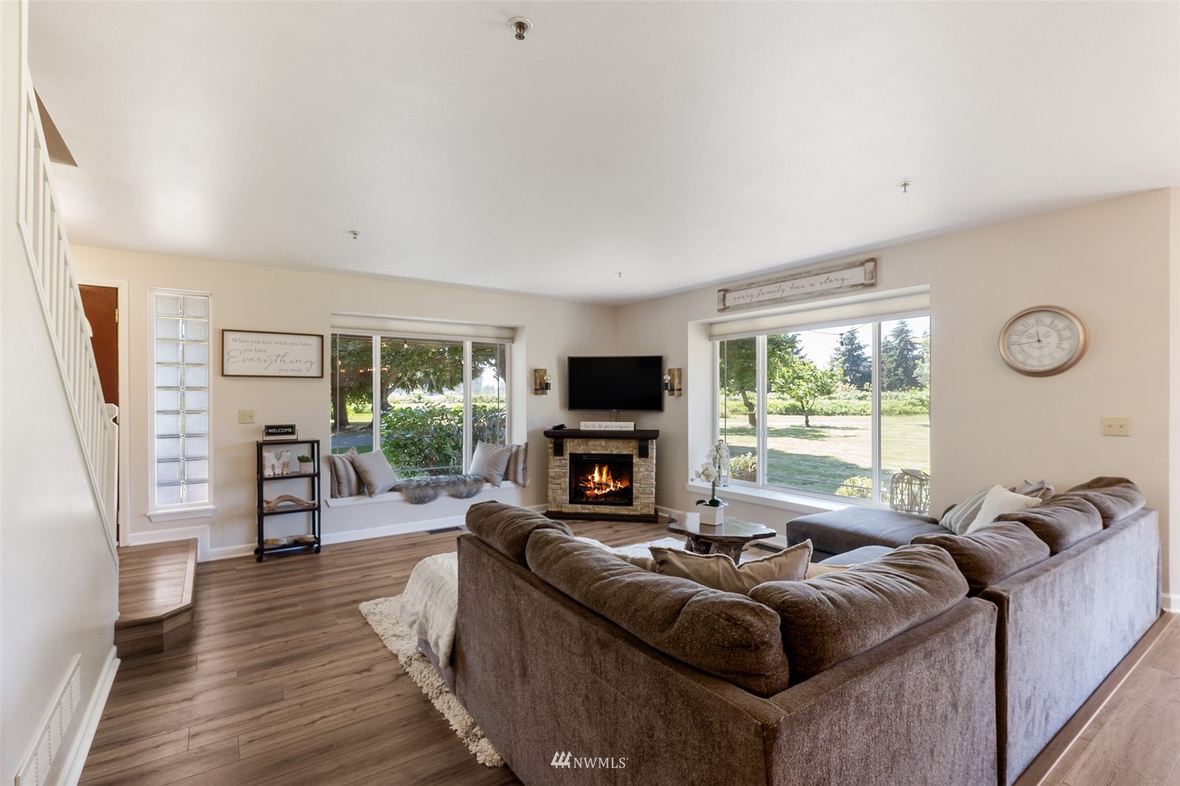 21847 Frager Road South Kent, WA 98032 - Photo 16 of 34 a living room with furniture large window and a fireplace
