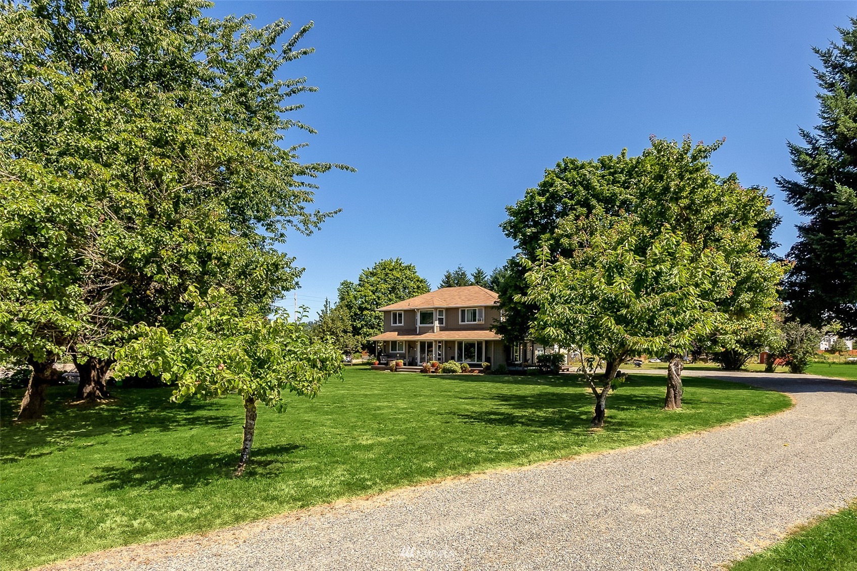 21847 Frager Road South Kent, WA 98032 - Photo 31 of 34 a front view of a house with a yard