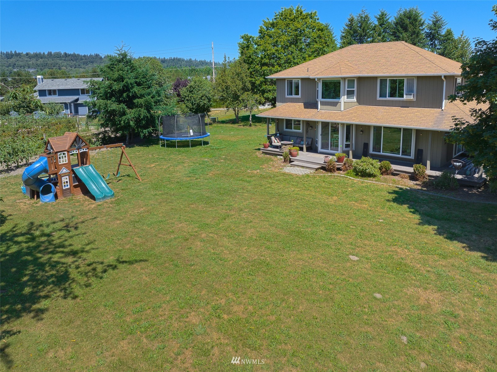 21847 Frager Road South Kent, WA 98032 - Photo 33 of 34 a view of an house with backyard space and balcony