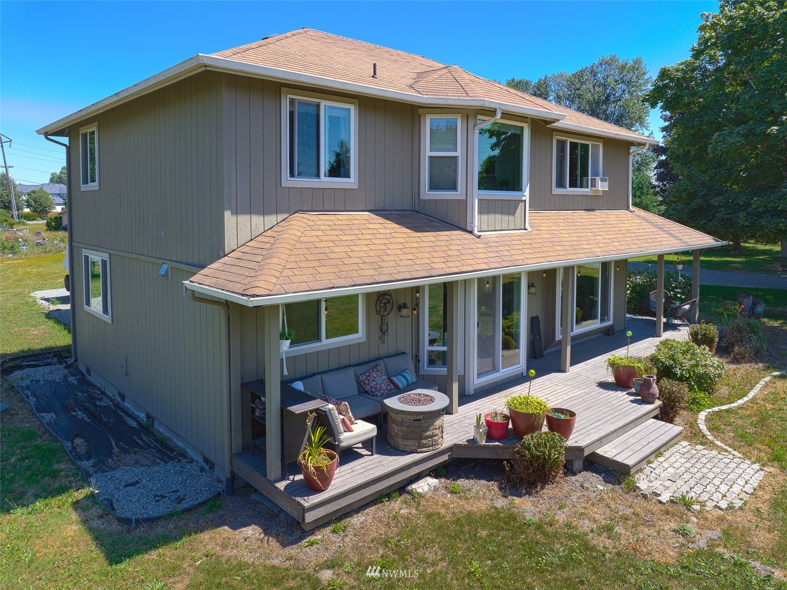 21847 Frager Road South Kent, WA 98032 - Photo 6 of 34 a backyard of a house with yard table and chairs