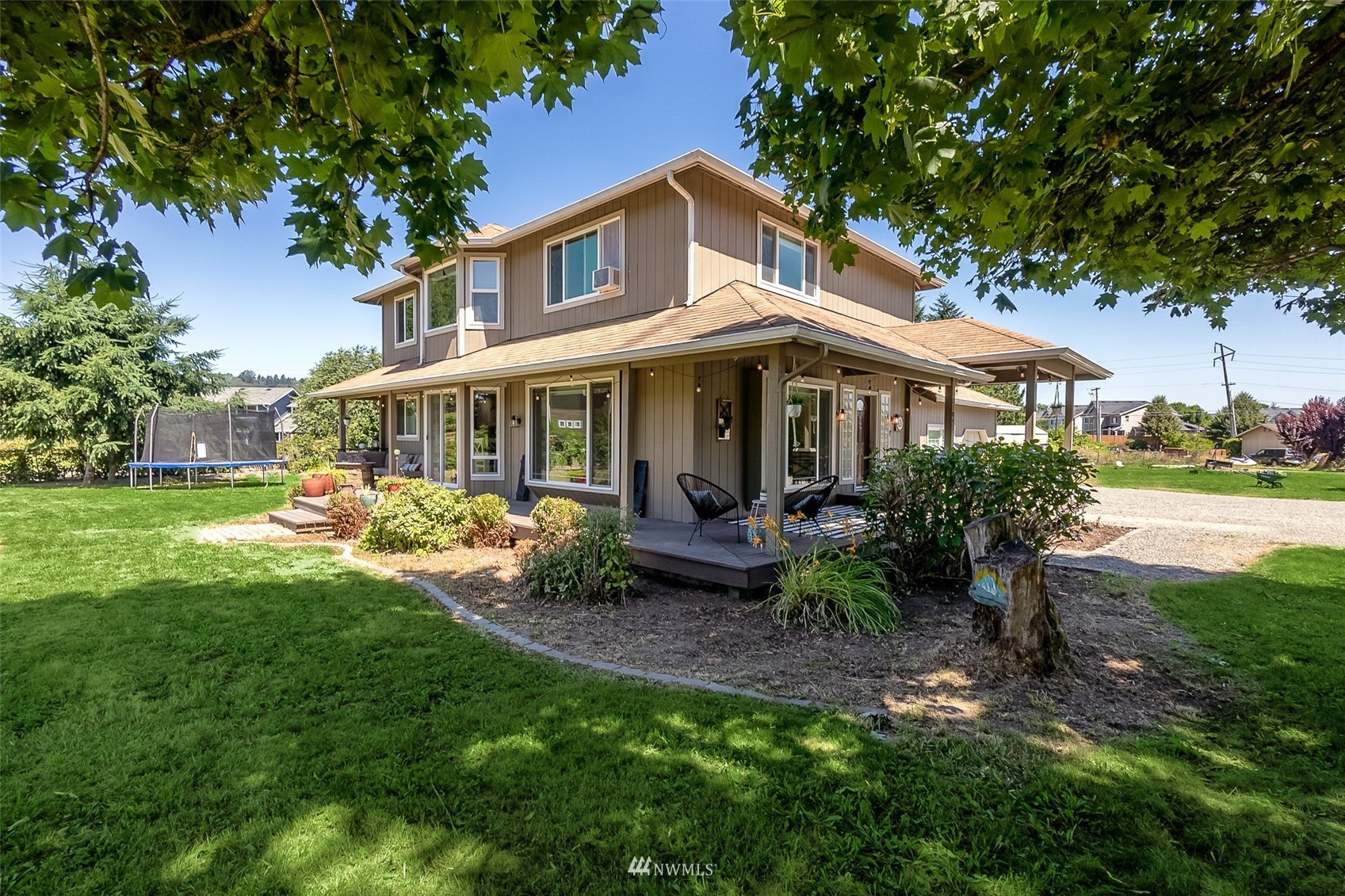 21847 Frager Road South Kent, WA 98032 - Photo 7 of 34 a view of a house with a yard patio and a garden
