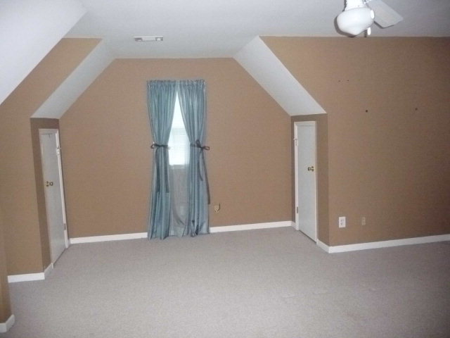 124 Rivoli Ridge Drive Macon, GA 31210 - Photo 13 of 17 an empty room with windows