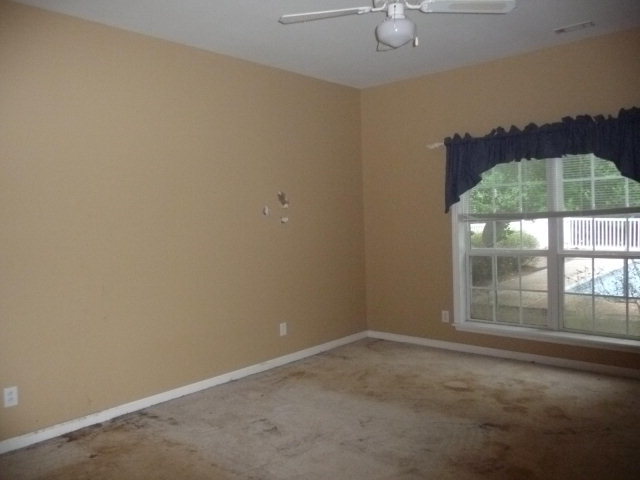 124 Rivoli Ridge Drive Macon, GA 31210 - Photo 17 of 17 an empty room with a window