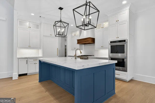 a view of bathroom with a shower and a sink