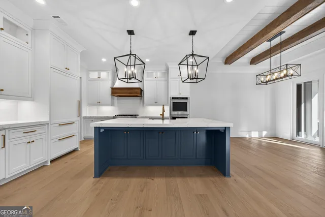 a white bath tub sitting next to a shower