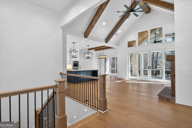 a view of a porch with wooden floor and outdoor space