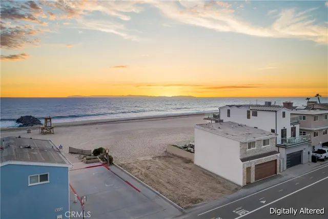 a view of a terrace with a ocean
