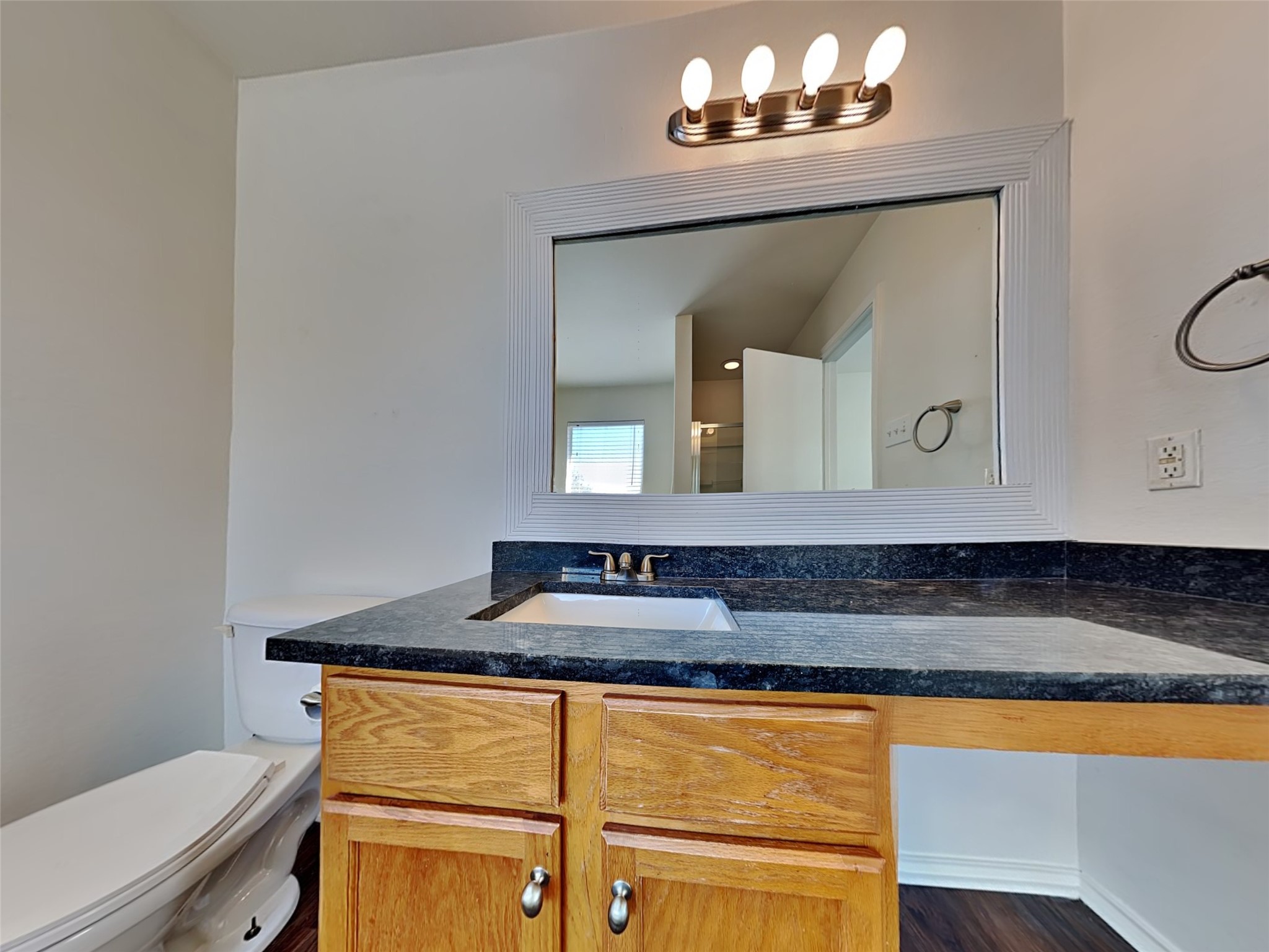 20930 Baronsledge Lane Katy, TX 77449 - Photo 12 of 21 a bathroom with a sink and a mirror
